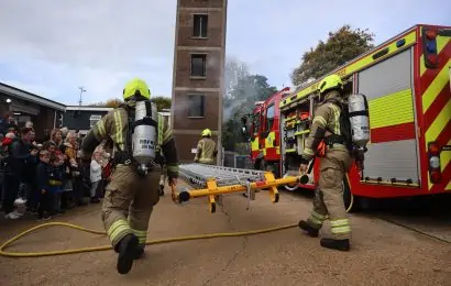 Firefighters taking part in a ladder drill at Bracknell Fire Station