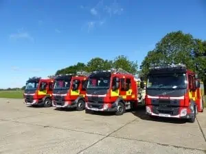 Four fire engines parked in a line