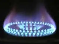 Hob with a lit gas flame