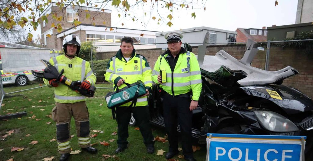 Emergency service staff support Operation Holly outside Wokingham Road Fire Station
