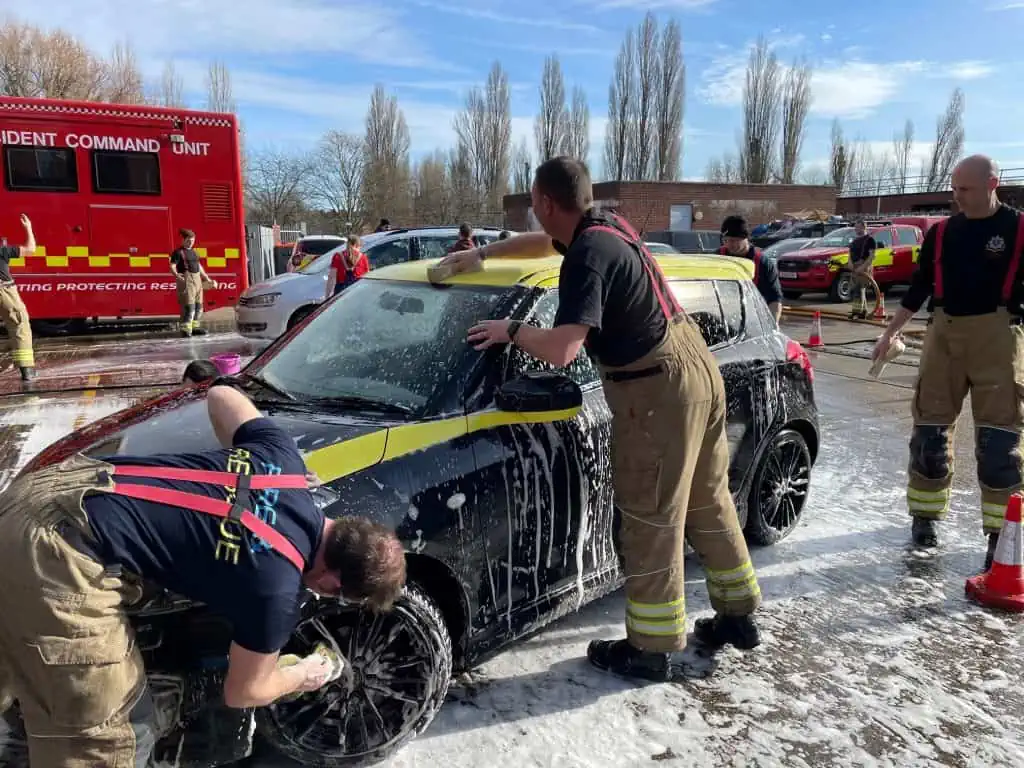 Staff at Maidenhead Fire Station’s charity car wash cleaning cars