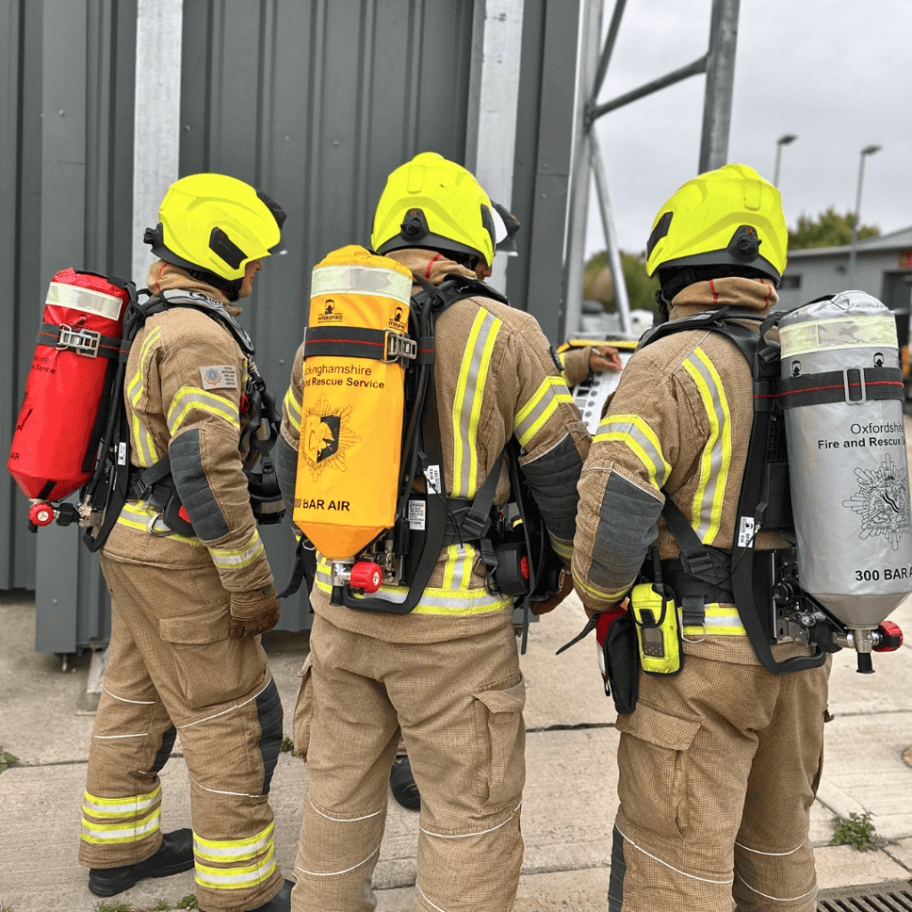 Firefighters from Berkshire, Buckinghamshire and Oxfordshire wearing breathing apparatus