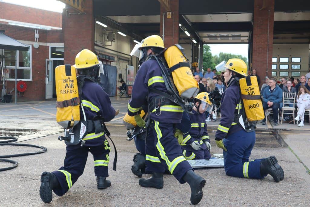 Several fire cadets huddled together