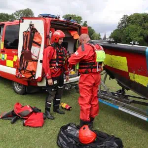Crews from Royal Berkshire Fire and Rescue Service demonstrate water rescue techniques in the River Thames near Pangbourne.