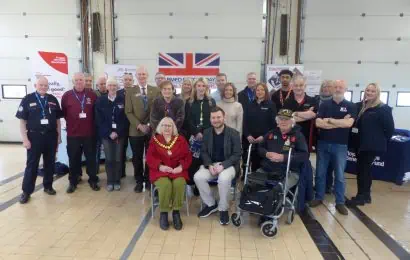 group of people at an armed forces veterans hub