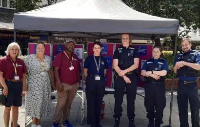 Seven people pictured at an Anti-Social Behaviour Awareness Week event. Includes members of the neighbourhood police team, housing officers, and Anti-Social Behaviour department from Wokingham Borough Council.