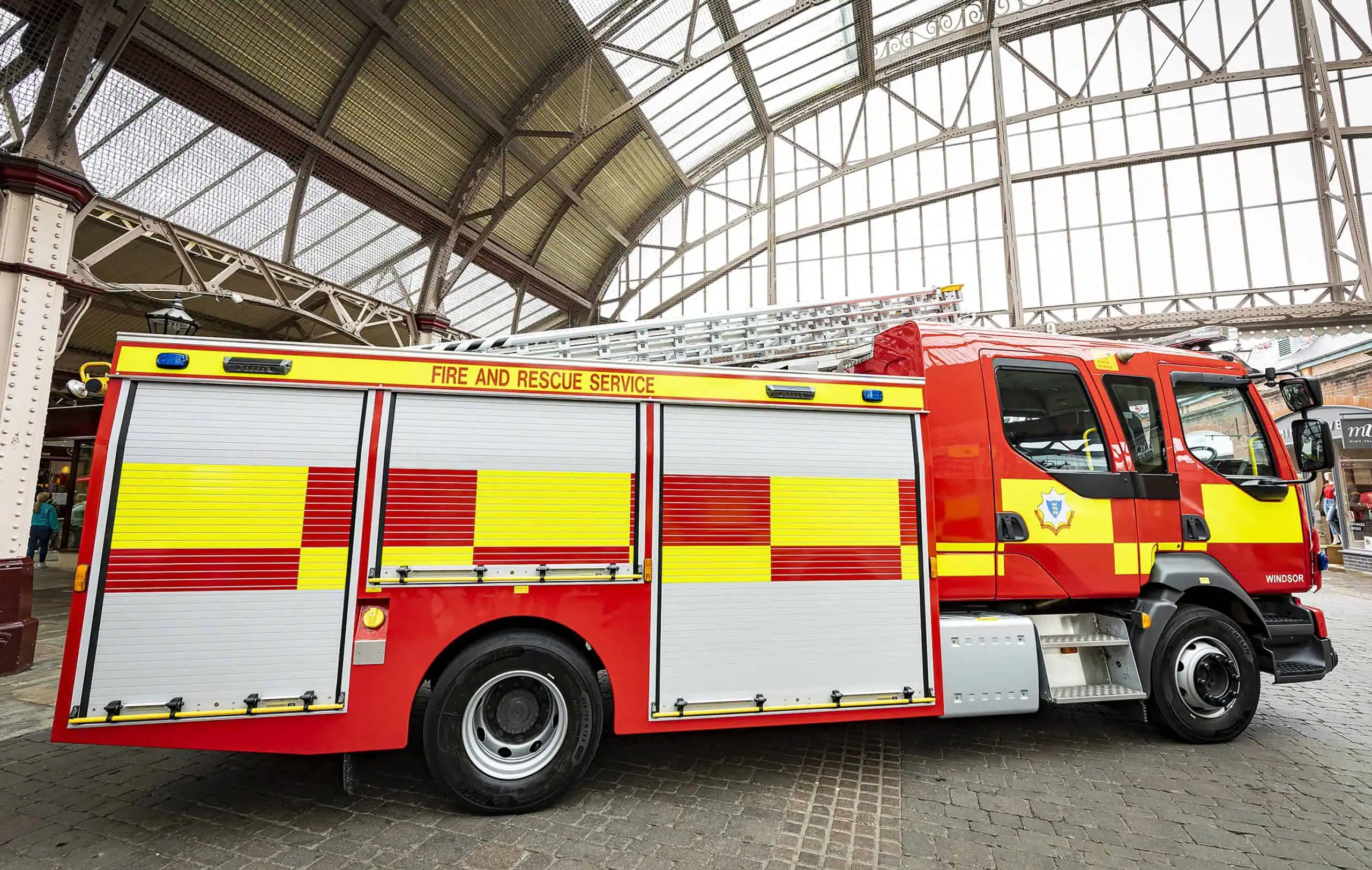 A Fire Engine parked in a station.