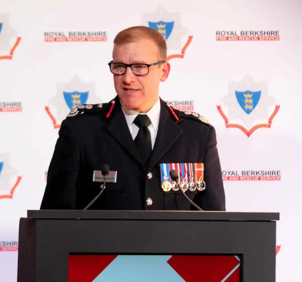 Wayne Bowcock, Chief Fire Officer, speaks at the 2024 Awards Ceremony at the podium