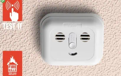 Smoke alarm on the ceiling. In the top corner is a "Test It" icon. In the bottom corner is the Fire Kills logo