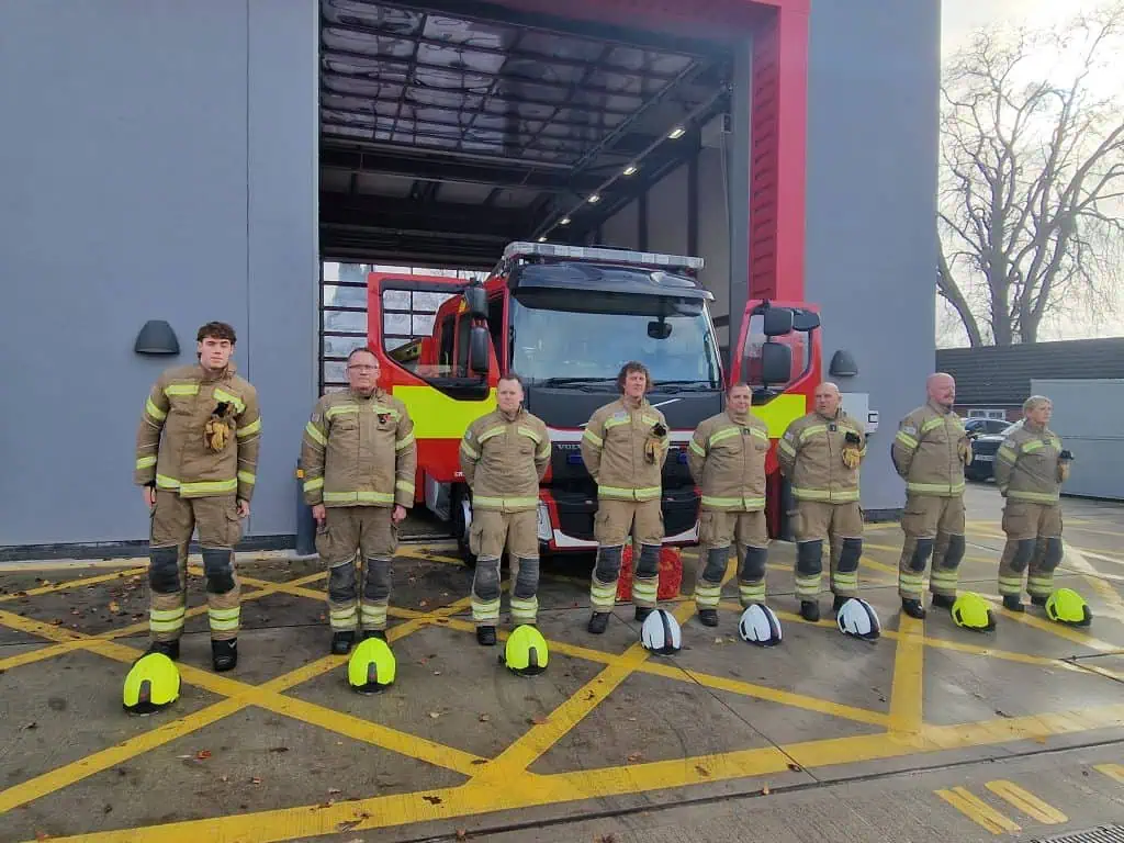 A group of eight firefighters outside Crowthorne Fire Station