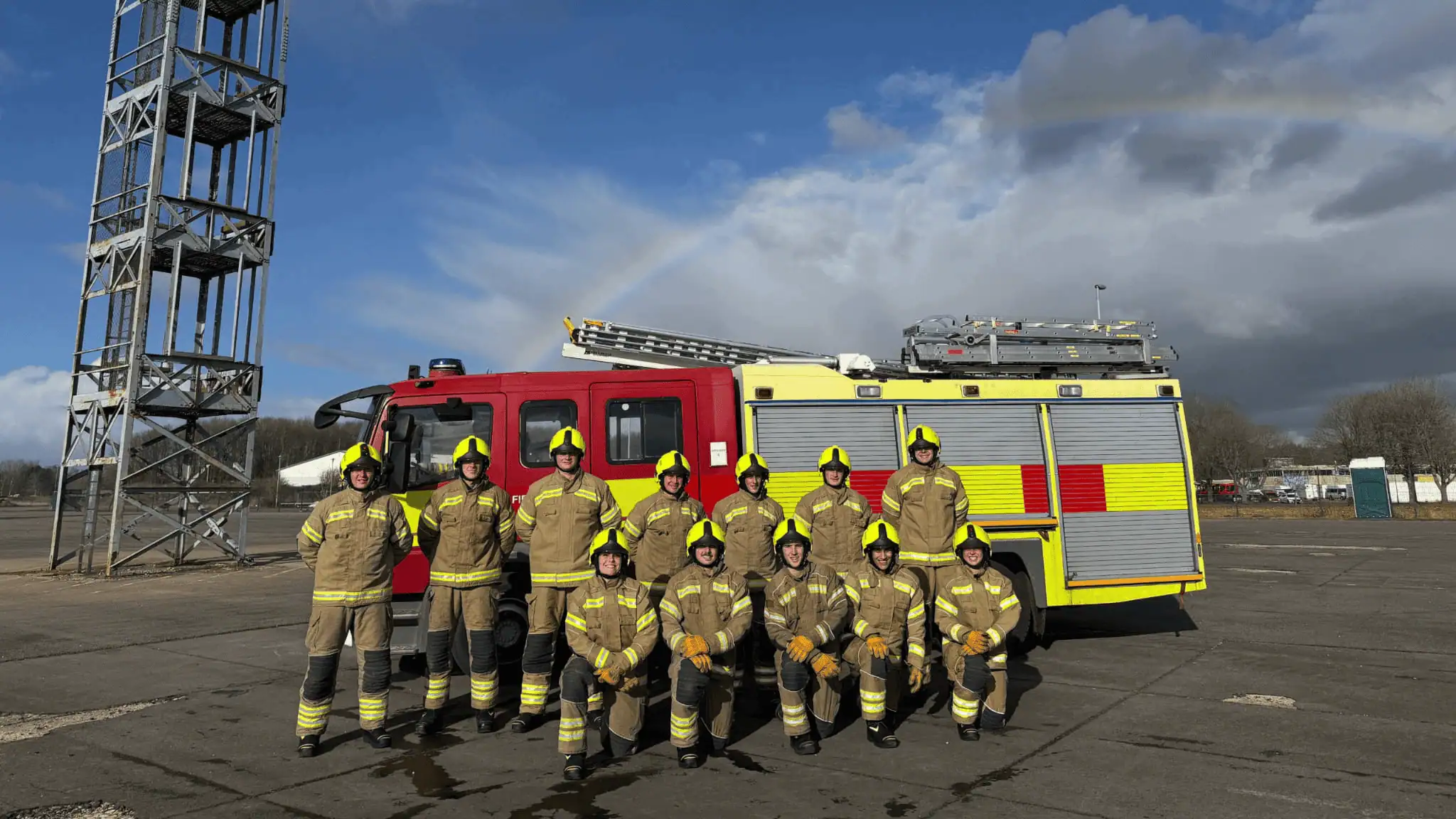 Our new Wholetime Firefighter Apprentices in front of a fire engine.